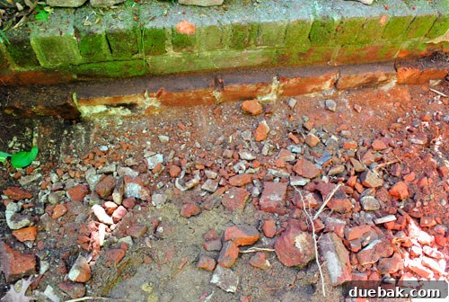 Achieving a Flawless Foundation for Your Paver Patio 9 Demolished brick staircase step, now just rubble