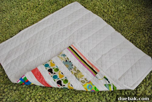 Another view of the quilt's backing and edges