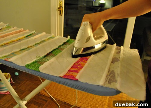 Back of quilt top with seams ironed flat