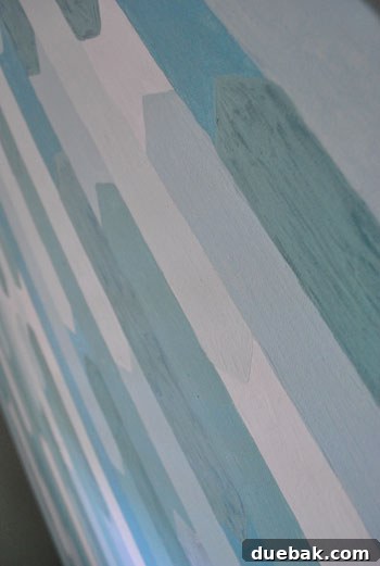 Close-up of the subtle tone-on-tone effect in the final painting