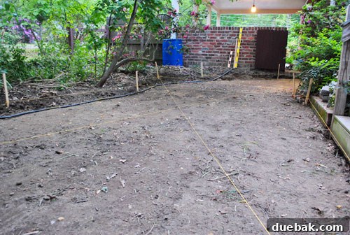 Patio area prepped and dug out for a DIY paver installation