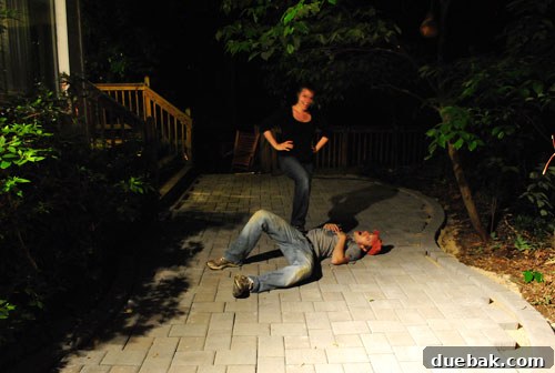 Blurry, tired, but triumphant photo of us after laying most of the patio pavers
