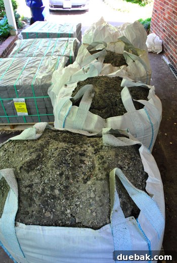 Close-up of three tons of gravel, the base layer for a new patio