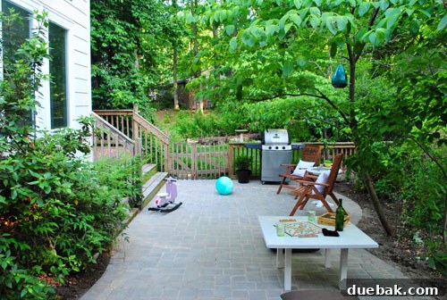 DIY Paver Patio: Transform Your Backyard 22 Finished patio with temporary furniture