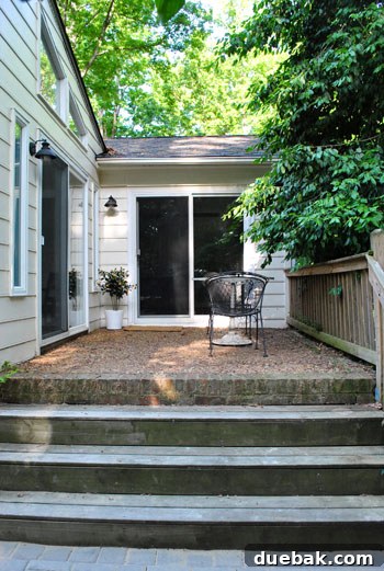 DIY Paver Patio: Transform Your Backyard 30 View from lower patio to upper patio