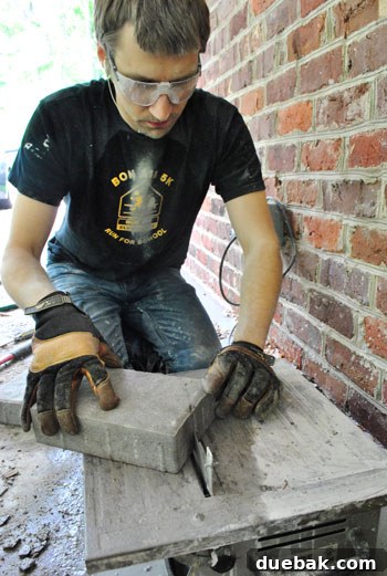 DIY Paver Patio: Transform Your Backyard 6 Using a wet saw to cut pavers