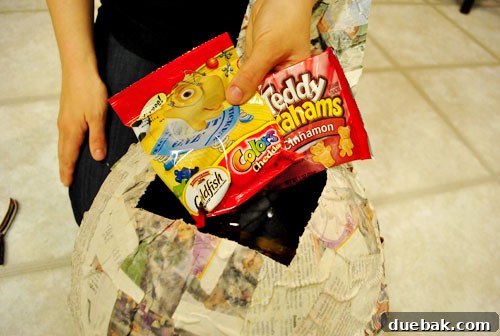 Craft Your Own Pull String Piñata 11 Filling the piñata with individually packaged snacks