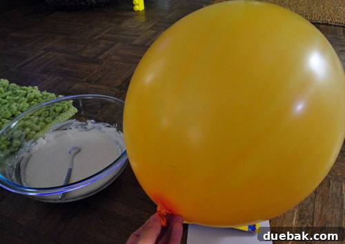Craft Your Own Pull String Piñata 3 Newspaper strips cut for paper mache