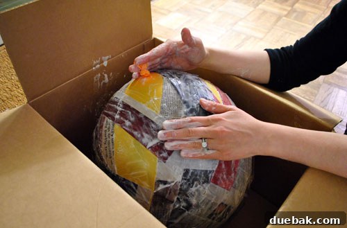 Craft Your Own Pull String Piñata 5 Paper mache covered balloon drying
