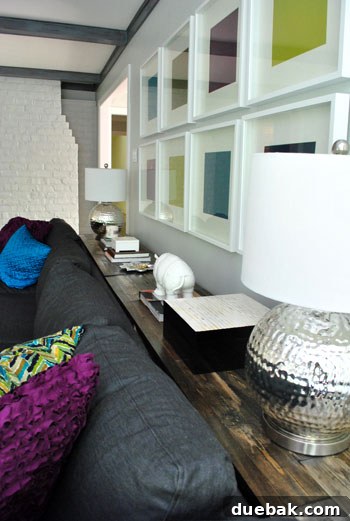 Securely Mounting Large Prints to Canvas Using Acrylic Medium 18 Living room with dark beams and sectional, showcasing bold design choices