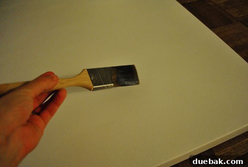 Securely Mounting Large Prints to Canvas Using Acrylic Medium 7 Brushing a thin, even coat of acrylic medium onto the canvas