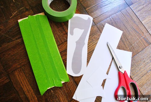 Wood plaque completely covered with painter's tape