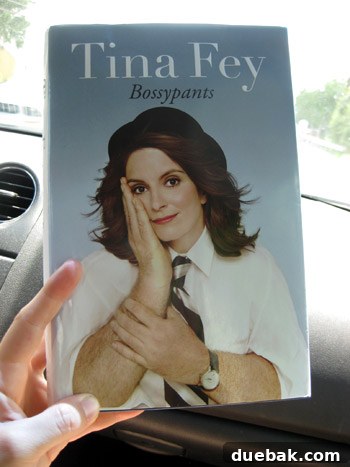 The cover of Tina Fey's book 'Bossypants,' recommended as a hilarious and entertaining read for road trips.