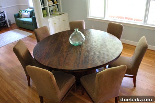Dining chairs with new mocha brown slipcovers