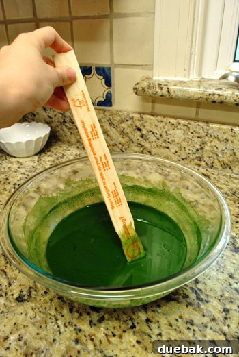 Stirring dye and salt mixture with a paint stick