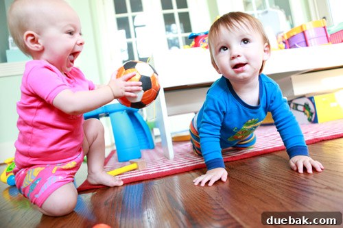 Shadow Play of the Petersiks 8 Two babies, Clara and Will, playing together on a rug, symbolizing budding friendship and shared joy.