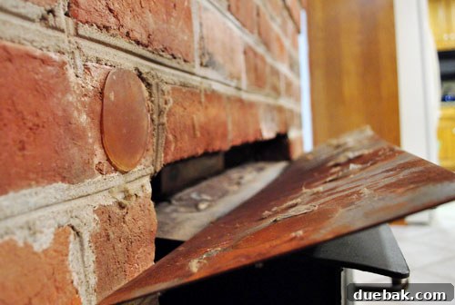 Close up of a small amount of glue on the wood stove