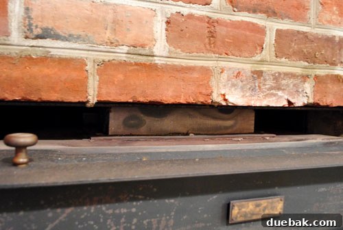 Bolts connecting the wood stove to the chimney vent