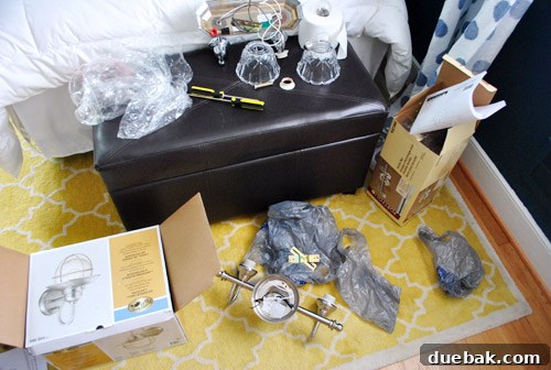 Shedding New Light on Our Bathroom 15 Tools and packaging outside the bathroom during fixture replacement