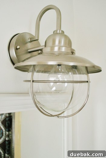 Shedding New Light on Our Bathroom 16 Second light fixture installed in guest bathroom