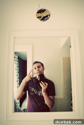 Shedding New Light on Our Bathroom 22 Author's selfie in the mirror with a filter