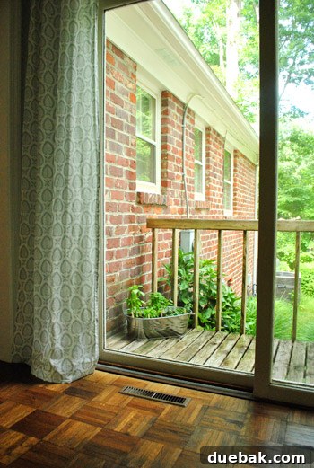 Galvanized tub herb garden placed on a sunny balcony
