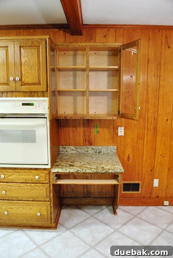 Removing Cabinets and Repairing Vinyl Flooring 10 Emptied desk area and upper cabinet, ready for demolition