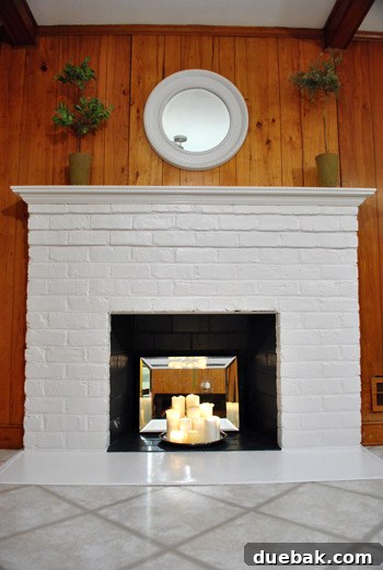 Revamping Our Wood Paneling with Paint 13 Fireplace after removing wood stove and painting brick