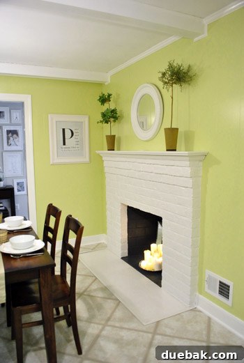 Revamping Our Wood Paneling with Paint 16 Another perspective of the transformed fireplace and paneling