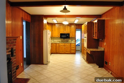 Revamping Our Wood Paneling with Paint 23 Another view of the kitchen on moving day