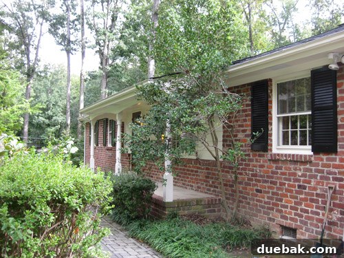 Close-up of bland front porch before makeover