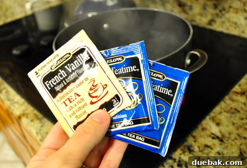 Vintage Charm Tea Staining Your Pillowcases 5 Tea bags brewing in hot water in a pot