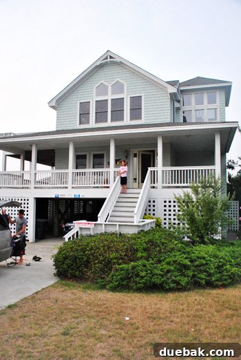 Sun-Drenched Serenity: A Duck Beach Getaway 3 Family enjoying the beach in Outer Banks