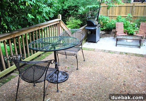 Another angle of the transformed patio area, highlighting the refreshed furniture