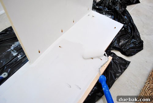 Disassembled shelving components for painting