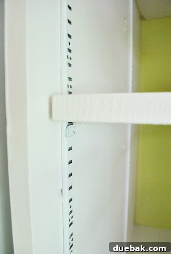Reinstalled shelves with metal tracks and clips