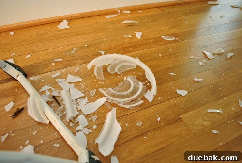Close-up of the new light fixture's base after the glass broke