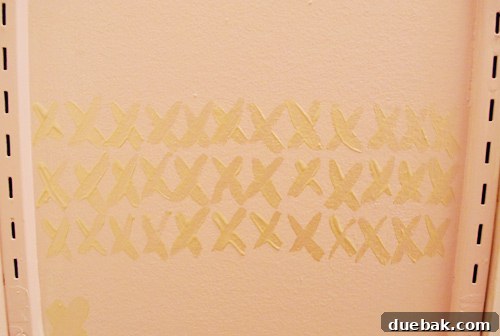 Experiment with freehand metallic 'X' patterns on the closet wall