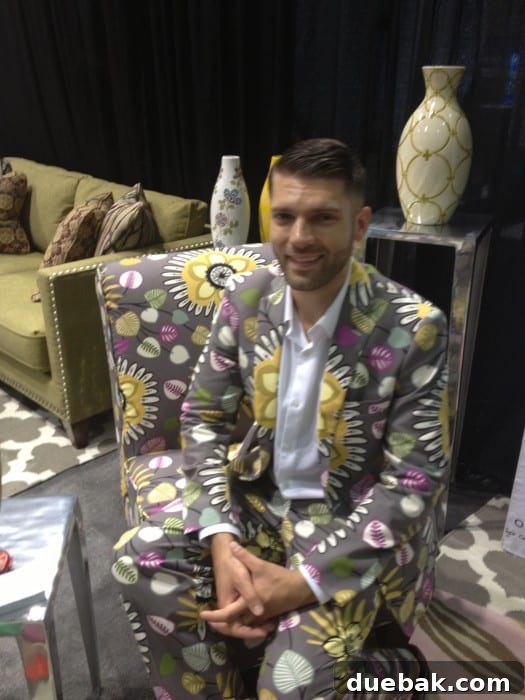 Windy City Glimpses 2 La-Z-Boy representatives in upholstery suits showcasing their chairs at BlogHer 13