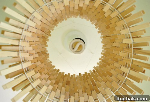 Clothespin chandelier from below, resembling a sunburst mirror