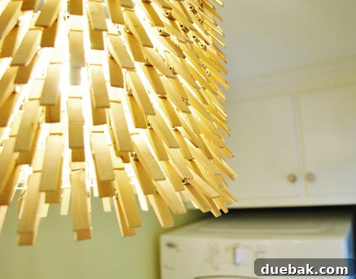Wide shot of the laundry room with the clothespin chandelier