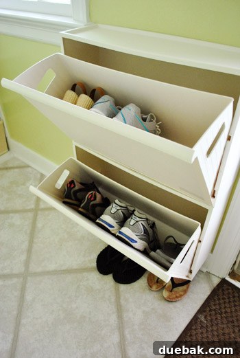 Open Ikea Retur shoe cabinet showing shoes inside