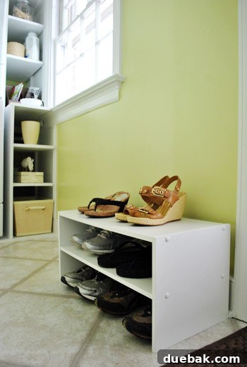 Repurposed shoe shelf in laundry room