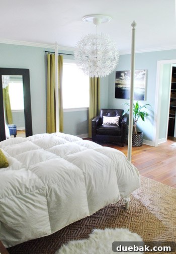 Frame Fusion: Spray Paint for Cohesive Style 15 Favorite corner view of the bedroom with mirror, chandelier, and chair