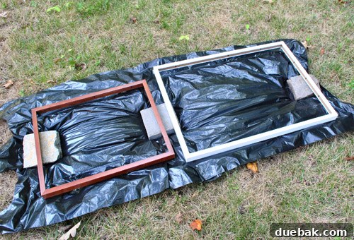 Frame Fusion: Spray Paint for Cohesive Style 6 Person spray painting picture frames outdoors