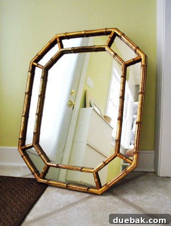 From Drab to Dreamy: Our Laundry Room Makeover 2 Laundry room with new mirror reflecting light, enhancing the room's brightness