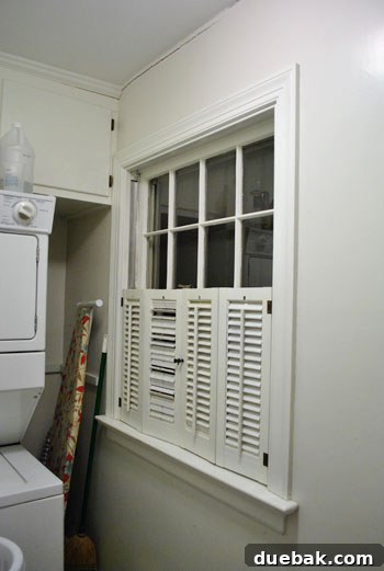 From Drab to Dreamy: Our Laundry Room Makeover 17 Before shot of the old, unrenovated laundry room - view 2, showing initial conditions
