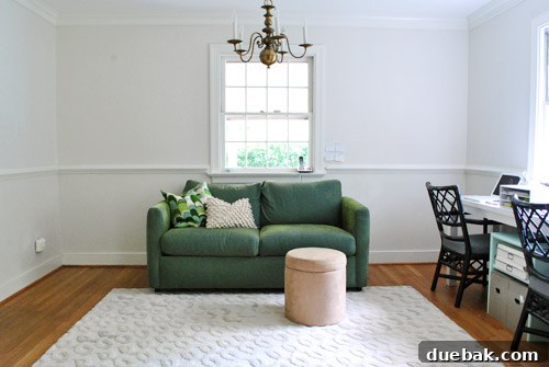 Sofa moved to the long wall in the home office, aiming for a cohesive look with the dining room.