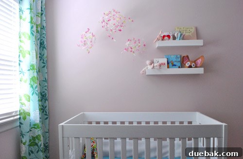 Nursery Refresh 12 Changing table with re-arranged frames on wall