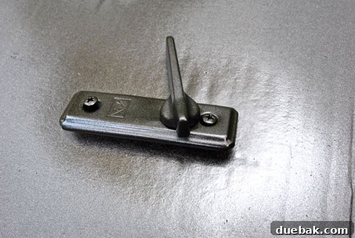 Transform Your Hardware with Spray Paint 11 Sprayed latch on cardboard